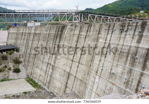Curved Concrete Wall Dam During Construction Stock Image