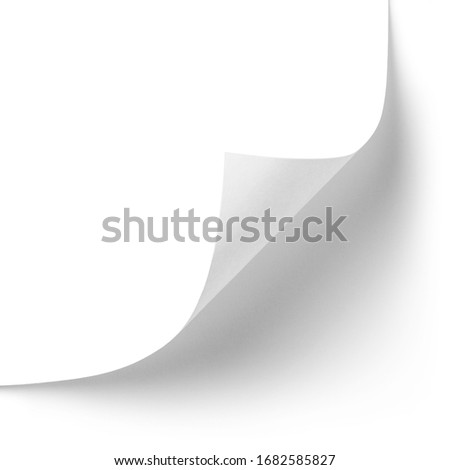 Curved corner of a paper page, isolated on white background