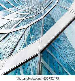 Curved diagonal perspective lines - abstract office architecture detail background with modern glass windows on a skyscraper  - square layout
