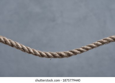 Curved Hemp Rope On Gray Background