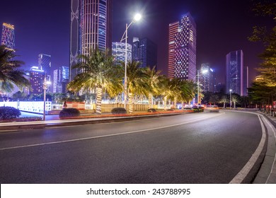 Curved Light Trails On The City Road In Guangzhou Central Business District With Modern Buildings At Night 