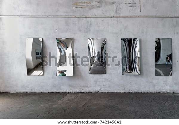 Curved mirrors of House of\
mirrors