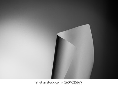 Curved Paper Against A Gradient Background