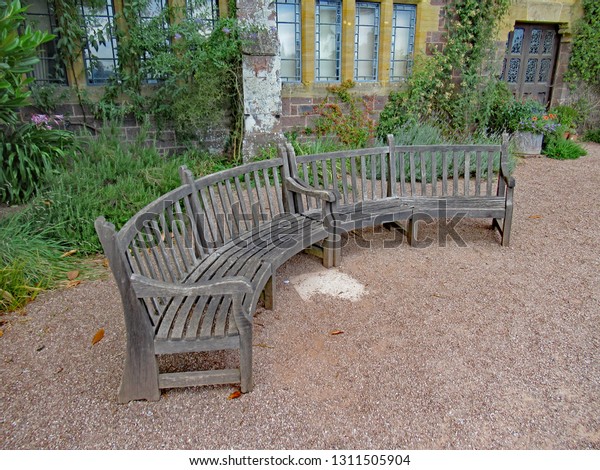 Curved Park Bench On Gravel Pathway Stock Image Download Now