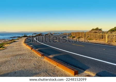 Curved road with an ocean view in the Monterey Bay town of Pacific Grove