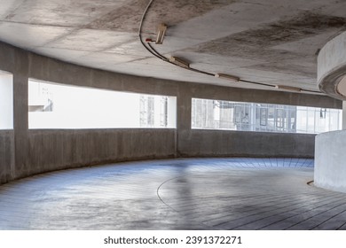 Curved way on the high building for parking lot tower,Spiral shaped entrance of parking garage - Powered by Shutterstock