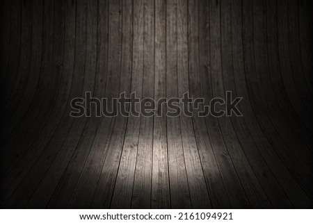 Curved wooden background. Empty Wooden backdrop. Wood texture background. Old curved wooden background Grungy old curved wooden interior with spotlight.