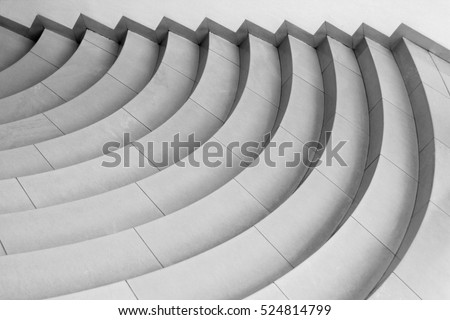 Curvilinear stairs. Top view of modern architecture detail. Refined fragment of contemporary office interior / public building.