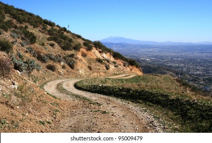 Curvy Fire Road Down A Mountain Side, Southern California