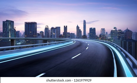 Curvy Flyover Highway Moving Forward Road With Bangkok Cityscape Evening Scene View . Motion Blur Effect Apply