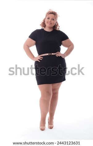 Curvy pretty cute Young Woman With blond Hair portrait in studio