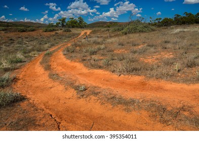 Curvy Red Soil Dirt Road Australian Outback Rural Wilderness Scene