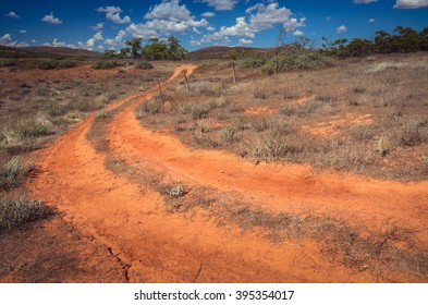 Curvy Red Soil Dirt Road Australian Outback Rural Wilderness Scene