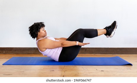 Curvy Woman In Yoga Class