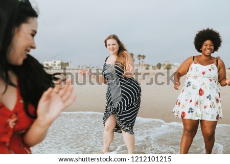 Curvy women at the beach