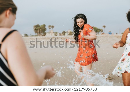 Curvy women at the beach