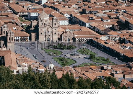 Cusco, Peru, May 6th 2009: View of Cusco's old town rooftops and the Church of the Society of Jesus