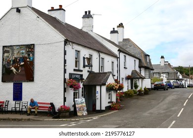 Cushendun, County Antrim, Northern Ireland, UK - August 26, 2022 - Country Pub On Village Street.