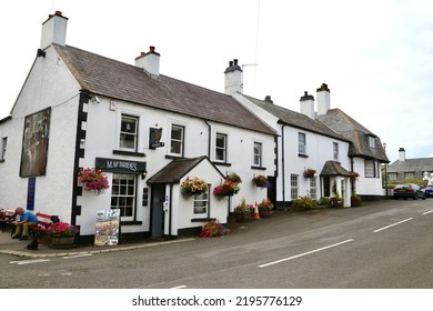 Cushendun, County Antrim, Northern Ireland, UK - August 26, 2022 - Country Pub On Village Street.