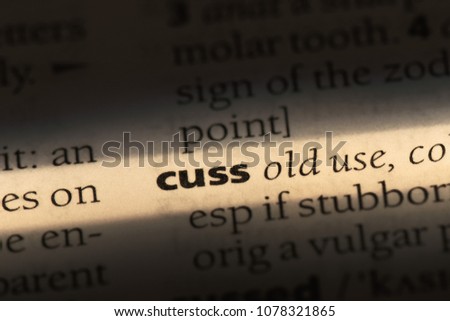 cuss word in a dictionary. cuss concept