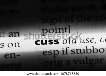 cuss word in a dictionary. cuss concept