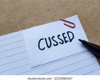 Cussed writting on table background