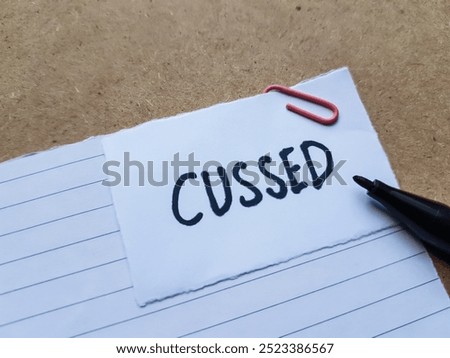 Cussed writting on table background