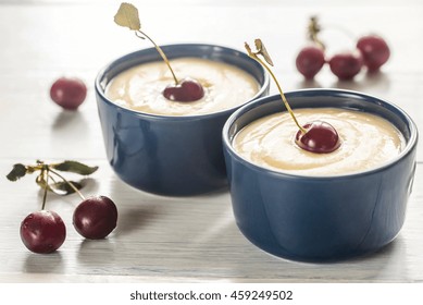 Custard with cherries