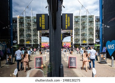 The Custard Factory Digbeth Birmingham UK 31.5.2021 Summer Day Reflection In Window With Happy People Enjoying Bars Restaurants And Shopping. Beautiful Mirror Image City Life Urban Skyline Sunny Sky.