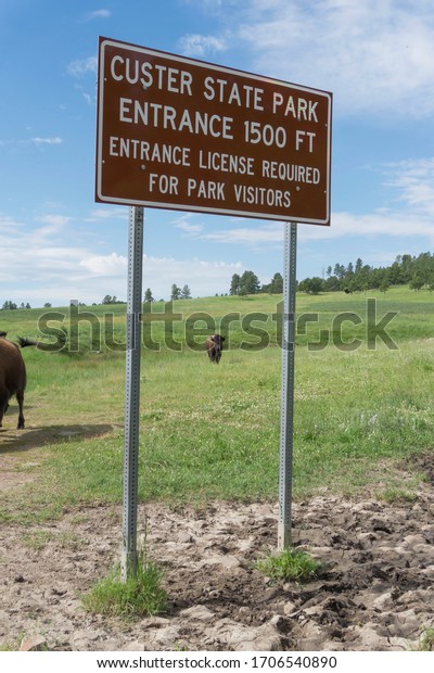 Custer, SD, USA, 2019-07-15: Road sign for\
Custer State Park Entrance coming\
up