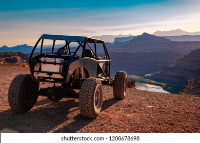 A Custom 4x4 Rock Crawler Off-Roading In The Sandstone Red Rock Terrain Outside Of Moab Utah In The American Southwest