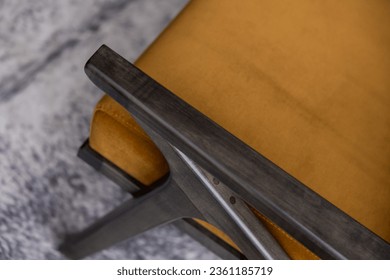 Custom designed interior mid century modern furniture close up of chair arm - Powered by Shutterstock