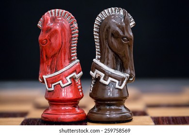 Custom designed knight chess pieces on custom wood board.