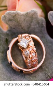 Custom Made Wedding Rings For The Bride And Groom Made Out Of Rose Gold By A Jewelry Maker In Portland Oregon.