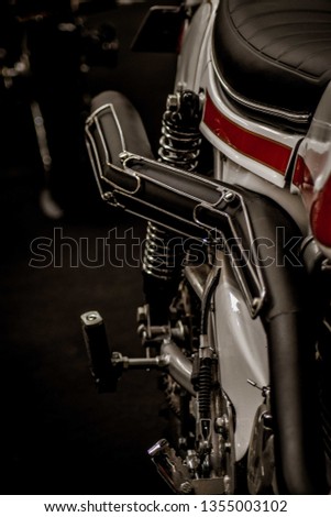 Similar – Senior man steering motorcycle on road