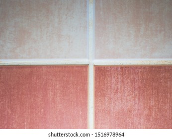 Custom Tile Bathroom Backsplash Wall With White  Chinks Between Tiles.