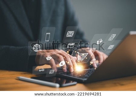 customer, buyer, Shopper using computer laptop to input order with trolley credit card delivery truck for online shopping and e-commerce technology concept.