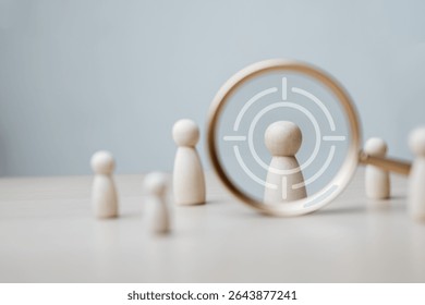 Customer data analytics. Behavior data analytics. Crm. Customer Behavior. A group of people are looking through a magnifying glass at a person. The people are all looking at the same person.