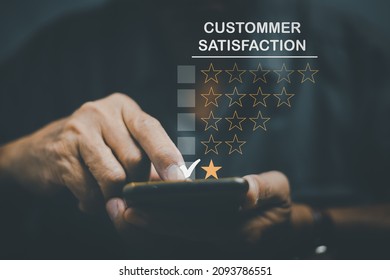 Customer dissatisfaction experience concept, the customer using smartphone expressing dissatisfaction with dissatisfied face, bad review, bad service, bad quality, low rating, bad social media.