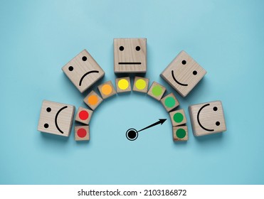 Customer evaluation indicator rating print screen wooden cube block since low to high on blue background for client satisfaction after use product and service  concept. - Shutterstock ID 2103186872
