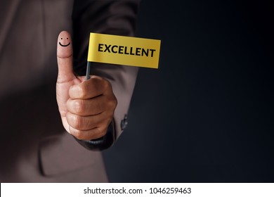 Customer Experience Concept, Best Excellent Services Rating for Satisfaction present by Thumb of Client with Excellent word and Smiley Face icon - Shutterstock ID 1046259463