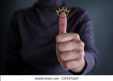 Customer Experience Concept, Best Excellent Services Rating for Satisfaction present by Thumb of Happy Client with Crown and Smiling Face icon - Shutterstock ID 1191471667