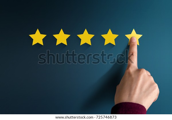Customer\
Experience Concept, Best Excellent Services Rating for Satisfaction\
present by Hand of Client pressing Five\
Star