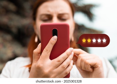 Customer Experience Concept. Excellent. Person using mobile phone with icon two star symbol to increase rating of company - Shutterstock ID 2025301328