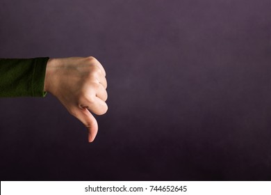 Customer Experience Concept, Hand of Client show Bad sign with Thumb down for Rating in Satisfaction Survey, Symbol of Meaning "Poor" 