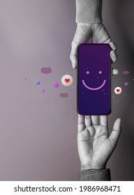 Customer Experience Concept. Happy Client Giving A Smiling Emoticon Via Mobile Phone To Brand. Feedback On Smartphone. Positive Review. Online Satisfaction Survey