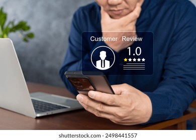 Customer Experience dissatisfied Concept, Unhappy Businessman Client with Sadness Emotion Face on smartphone screen, Bad review, bad service dislike bad quality, low rating, social media not good.