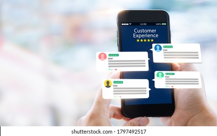 Customer Experience,review Concept.Hands Holding Mobile Phone