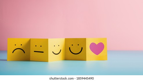 Customer Experiences Concept. Feedback Symbol on Fold Paper from Negative to Positive Review. Poor to Excellent. Hate to Love. Client's Satisfaction Surveys - Shutterstock ID 1859445490