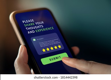Customer Experiences Concept. Woman Using Mobile Phone to Giving Feedback via the Internet. Positive Review. Client Satisfaction Surveys - Shutterstock ID 1814442398